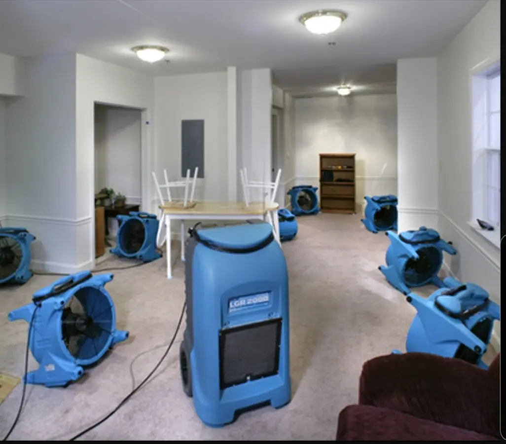 Air movers and dehumidifier setup for Water Damage Restoration in Speedway